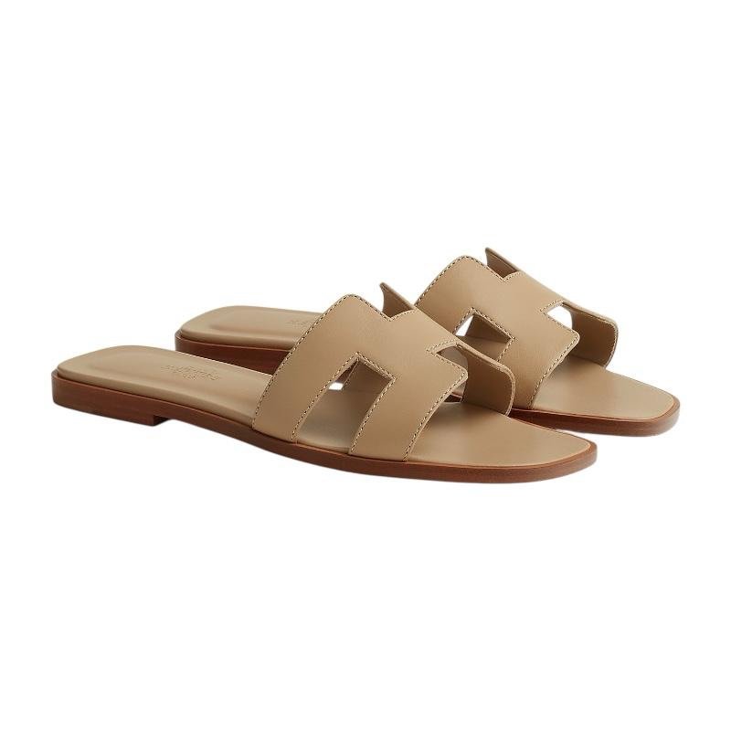 792c4bd6-acef-4667-b037-3daa9ca513aa.jpeg Hermes Light Brown Leather Oran Flat Slides - Image 2