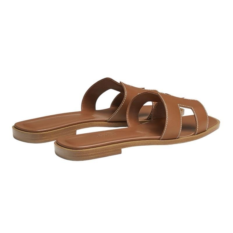 e91b3552-07f7-4f53-b1e4-9d80549d6a87.jpeg Hermes Brown Leather Oran FlatSandals - Image 3
